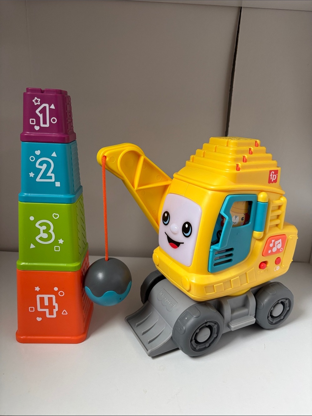 Fisher-Price Yellow Crane Wrecking Ball Toy with Colorful Stacking Cups